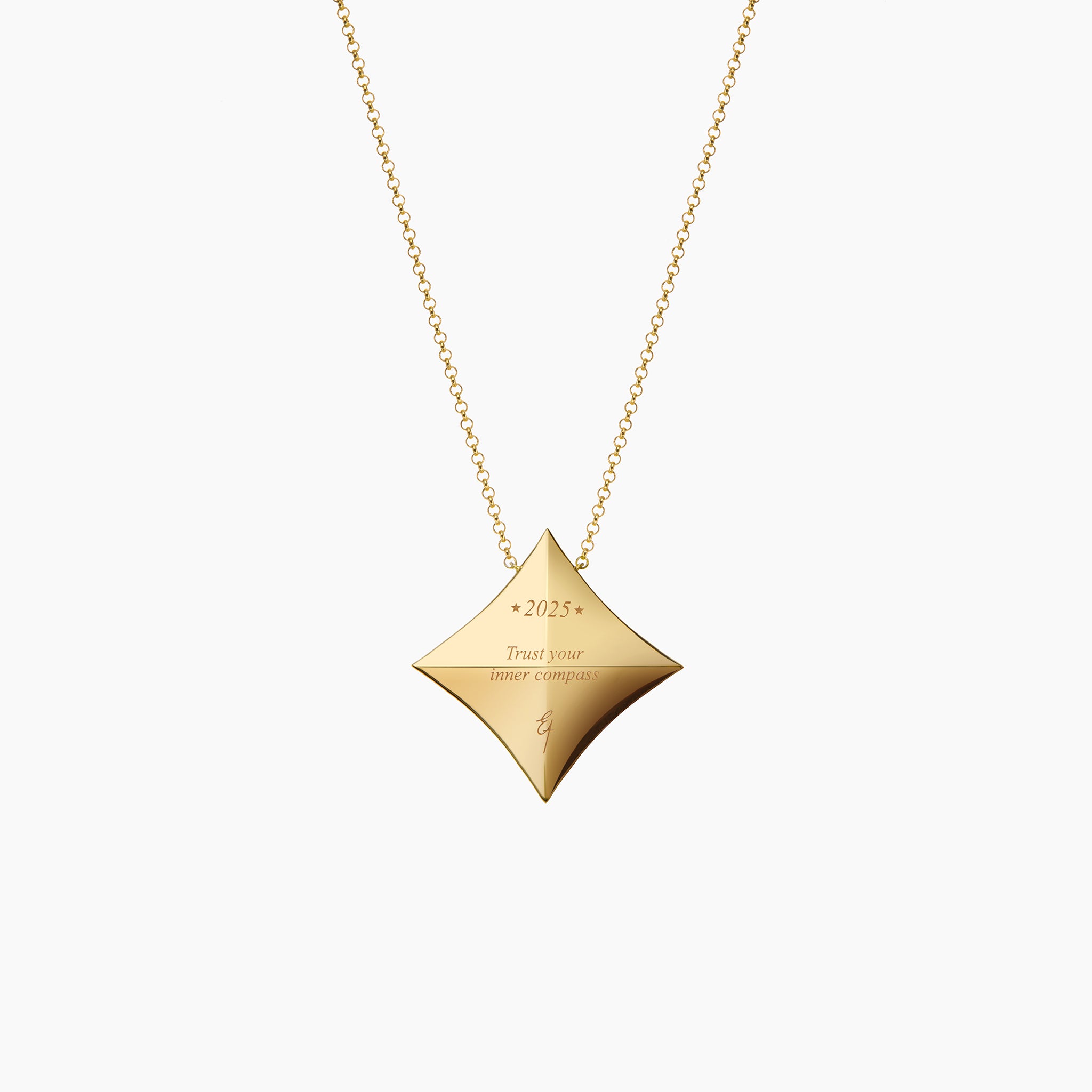 The back of 2025 Trust Your Inner Compass Lucky Charm against an off white background