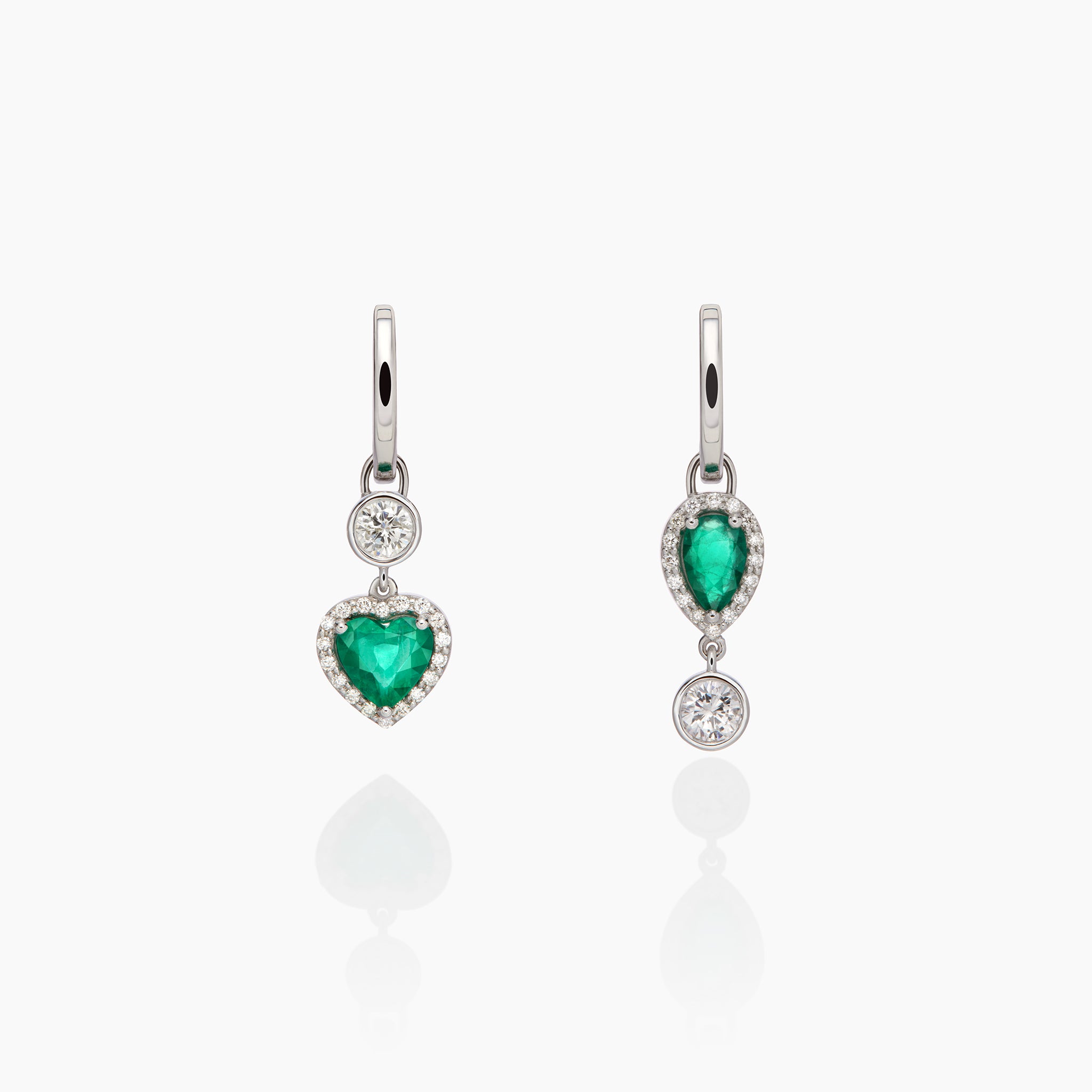 Asymmetric Eros Emerlad & Diamond Hoop Earrings displayed on an off white background