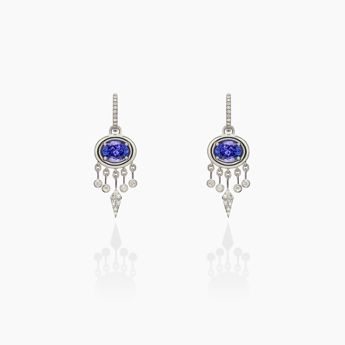 Gypset Earrings: Diamond and Tanzanite Jewellery Set on an Off-White Background