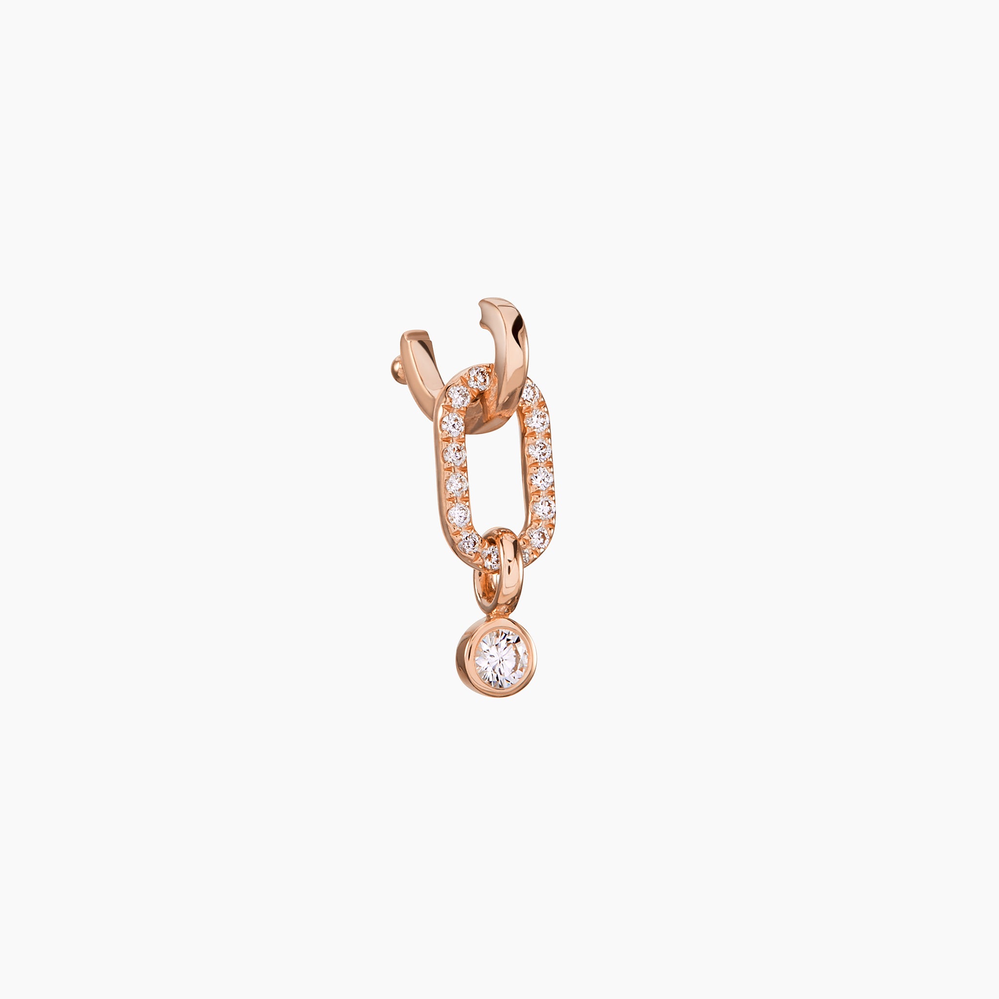 Close up of the convertible Horsebit Hoop link Pendant displayed on an off white background