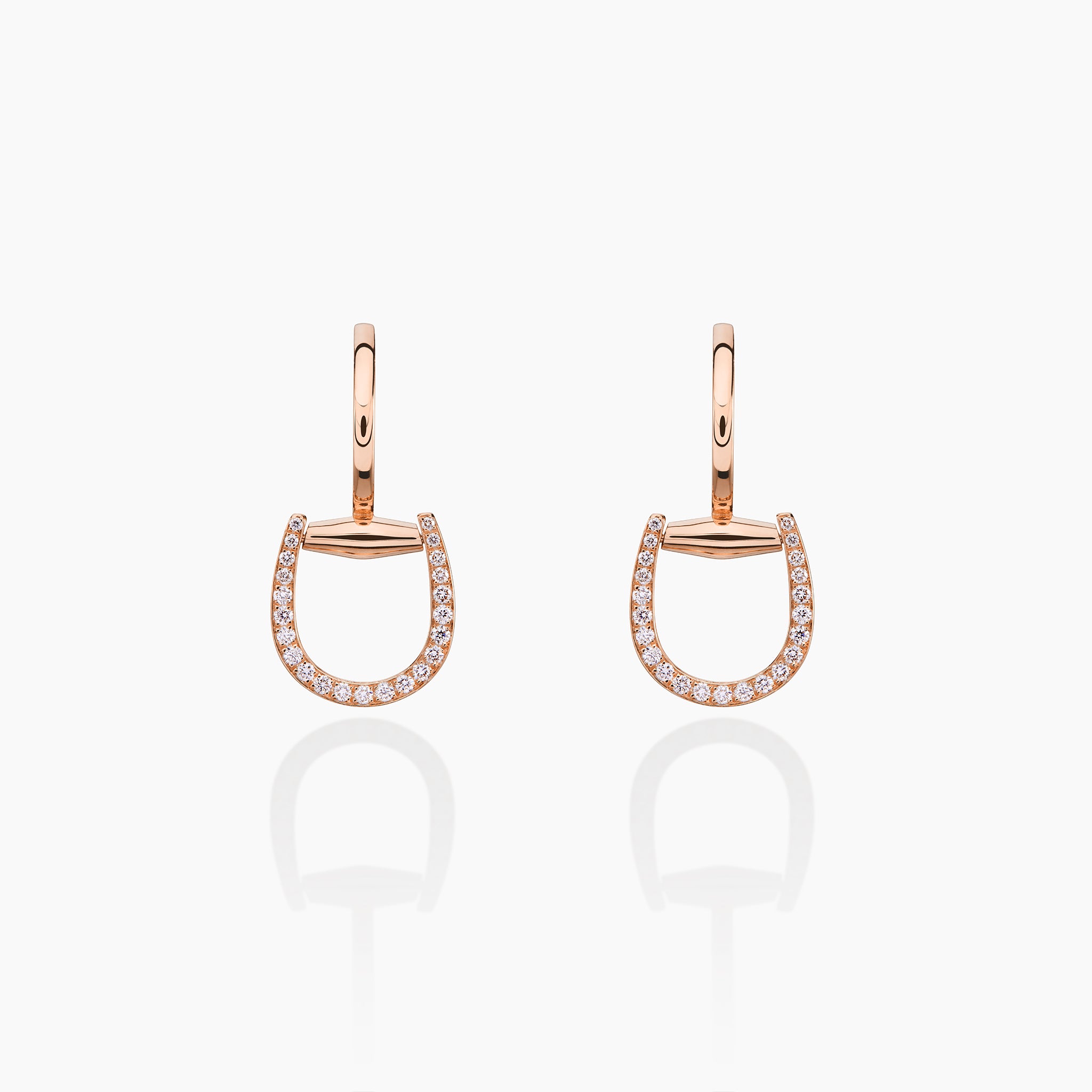 Convertible Horsebit Hoop Earrings displayed against off white background