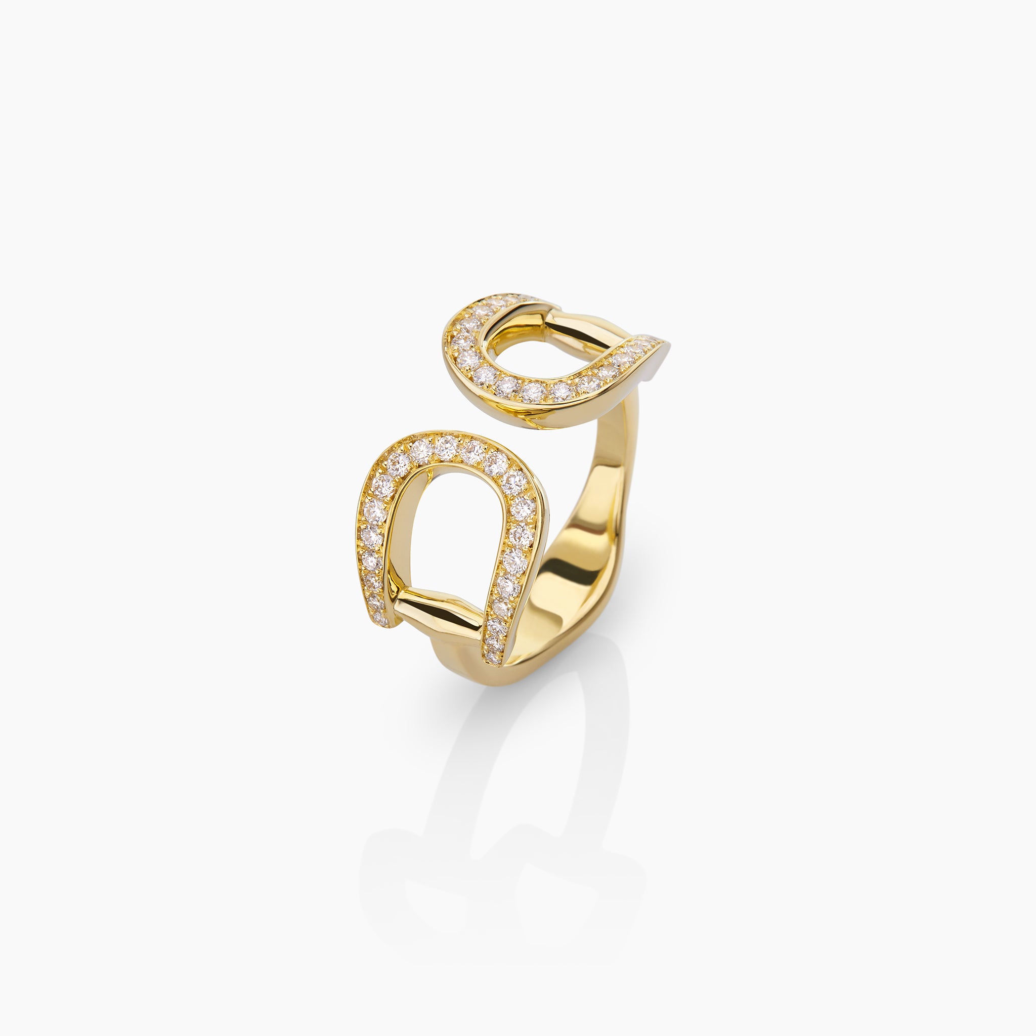 Horsebit Saddle Ring displayed on an off white background.