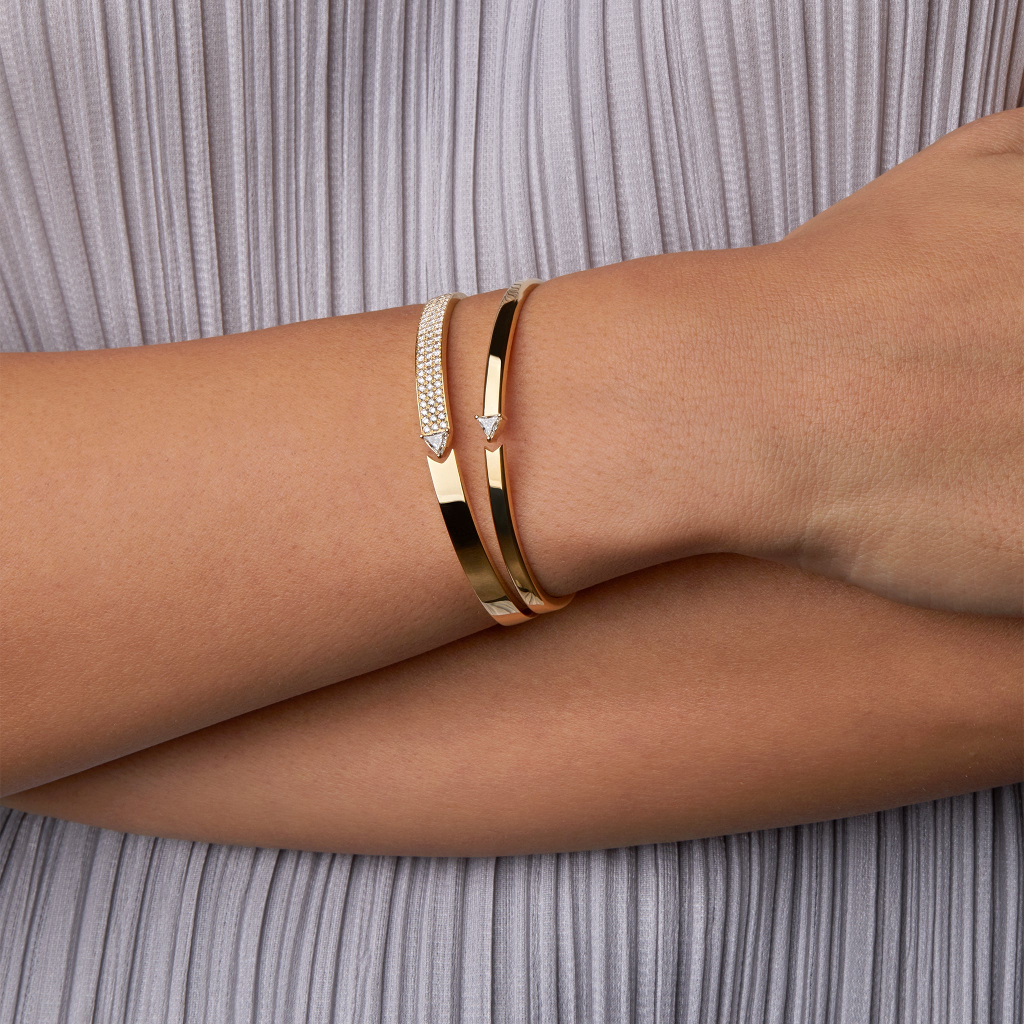 Stellar Standstill bangles portrayed on hand model.