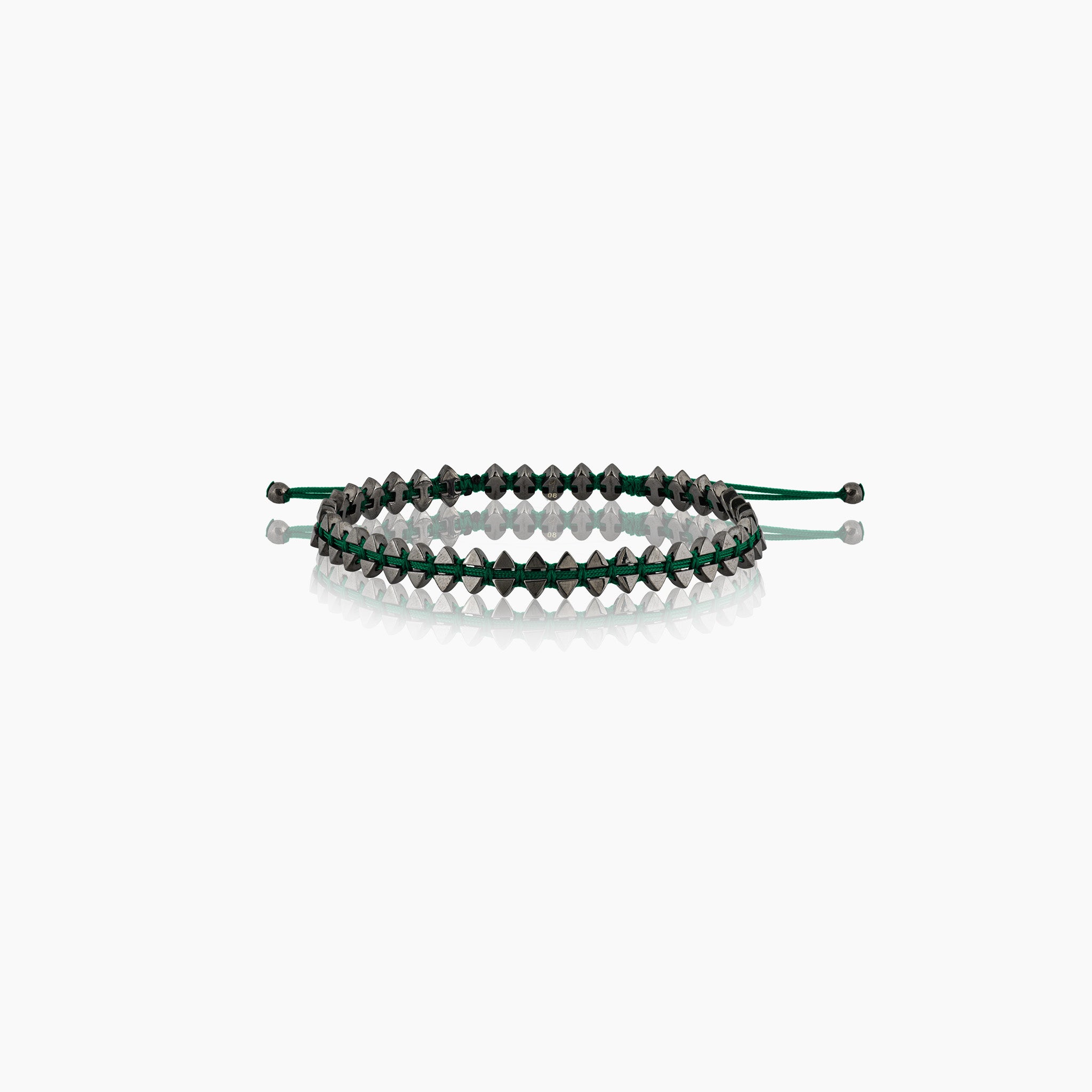 Men's dual-sided anchor bracelet with anchor and boat-inspired triangle motifs, showcased against an off-white background.