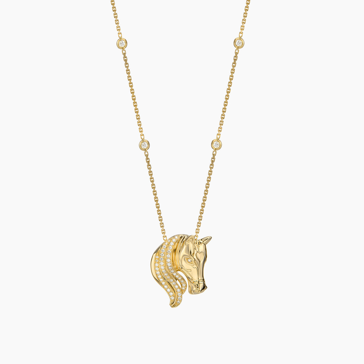 Gold horse head necklace on a white background