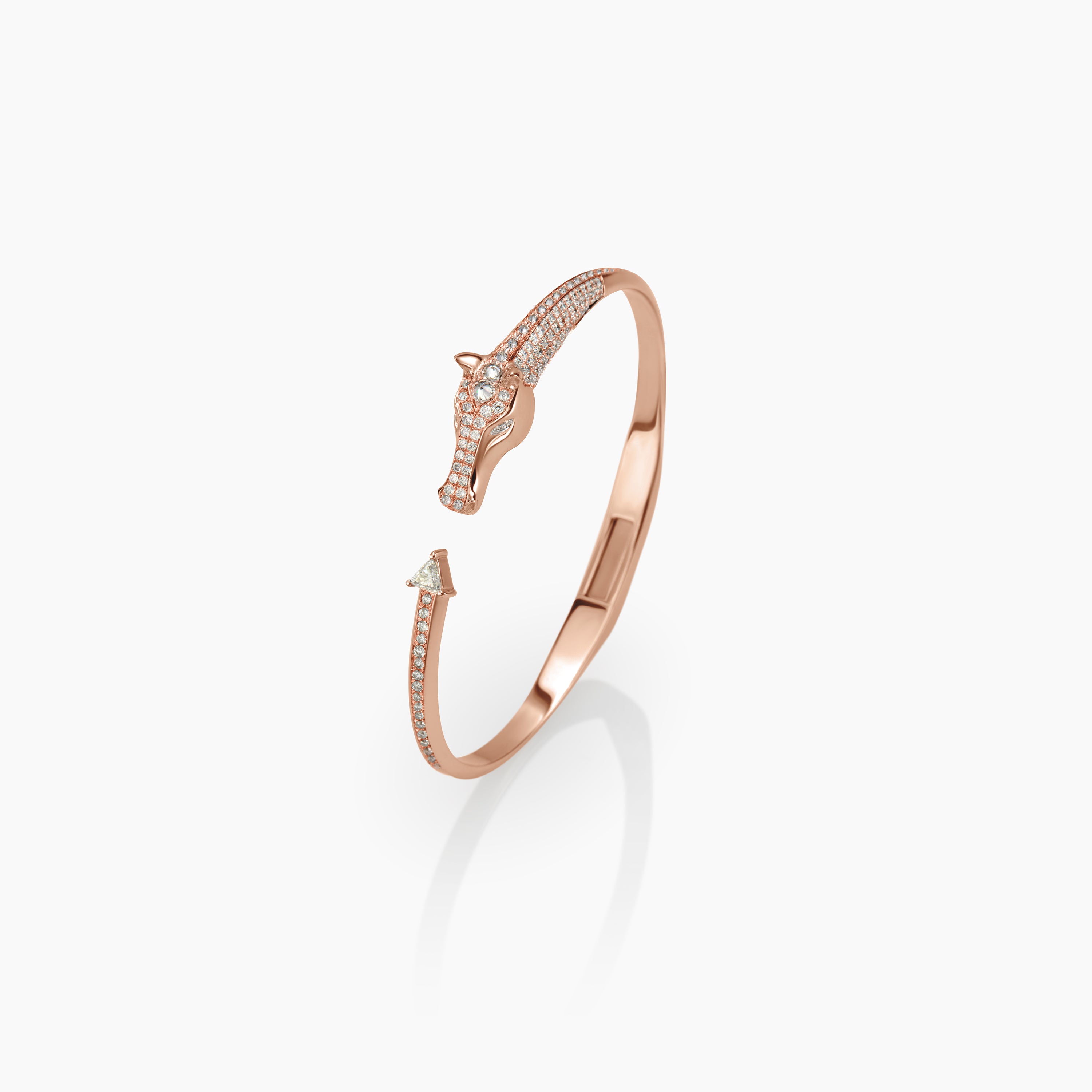 Rose gold bracelet with diamond accents on a white background