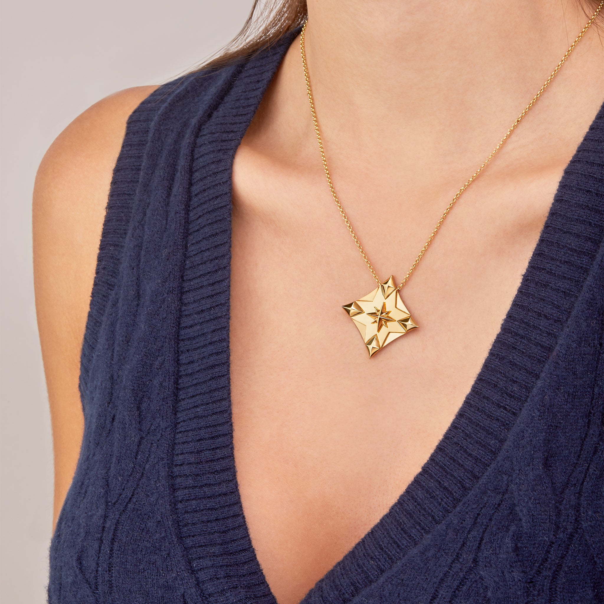 yellow gold Lucky Charm 2025 displayed
on model