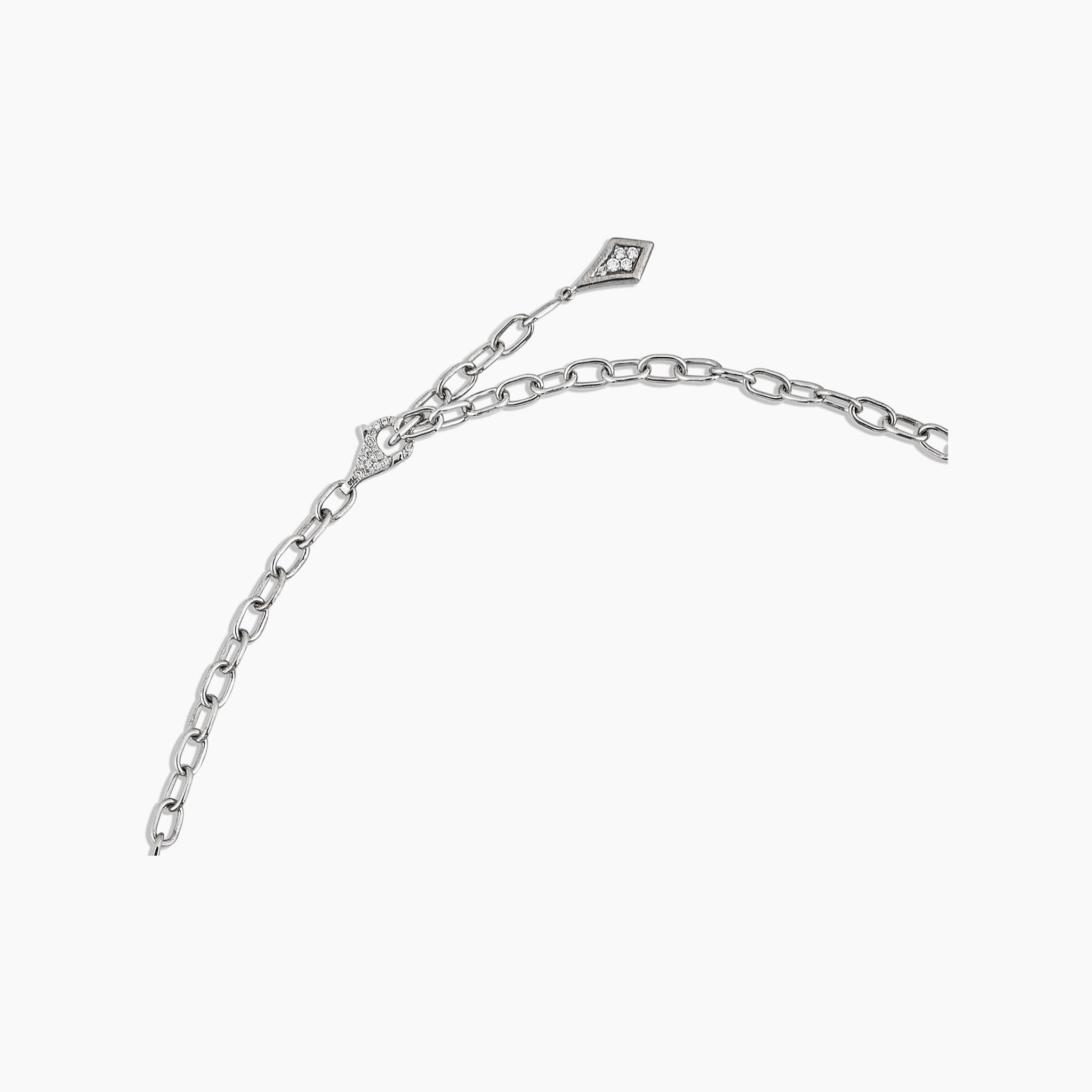 Polaris Necklace: A dazzling arrangement of diamonds set in white gold, showcased against an off white background.