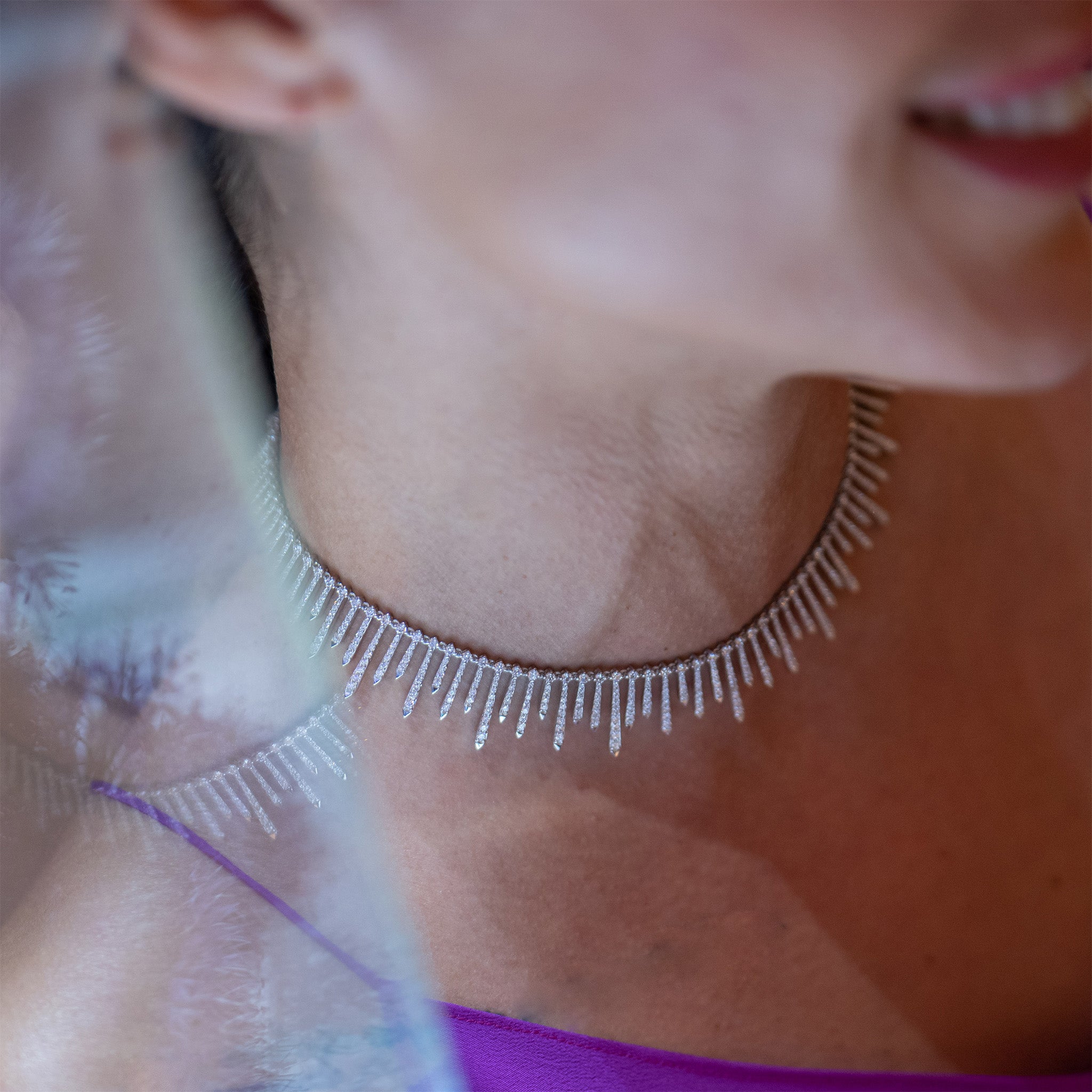 Polaris Necklace: A dazzling arrangement of diamonds set in white gold, showcased on model.