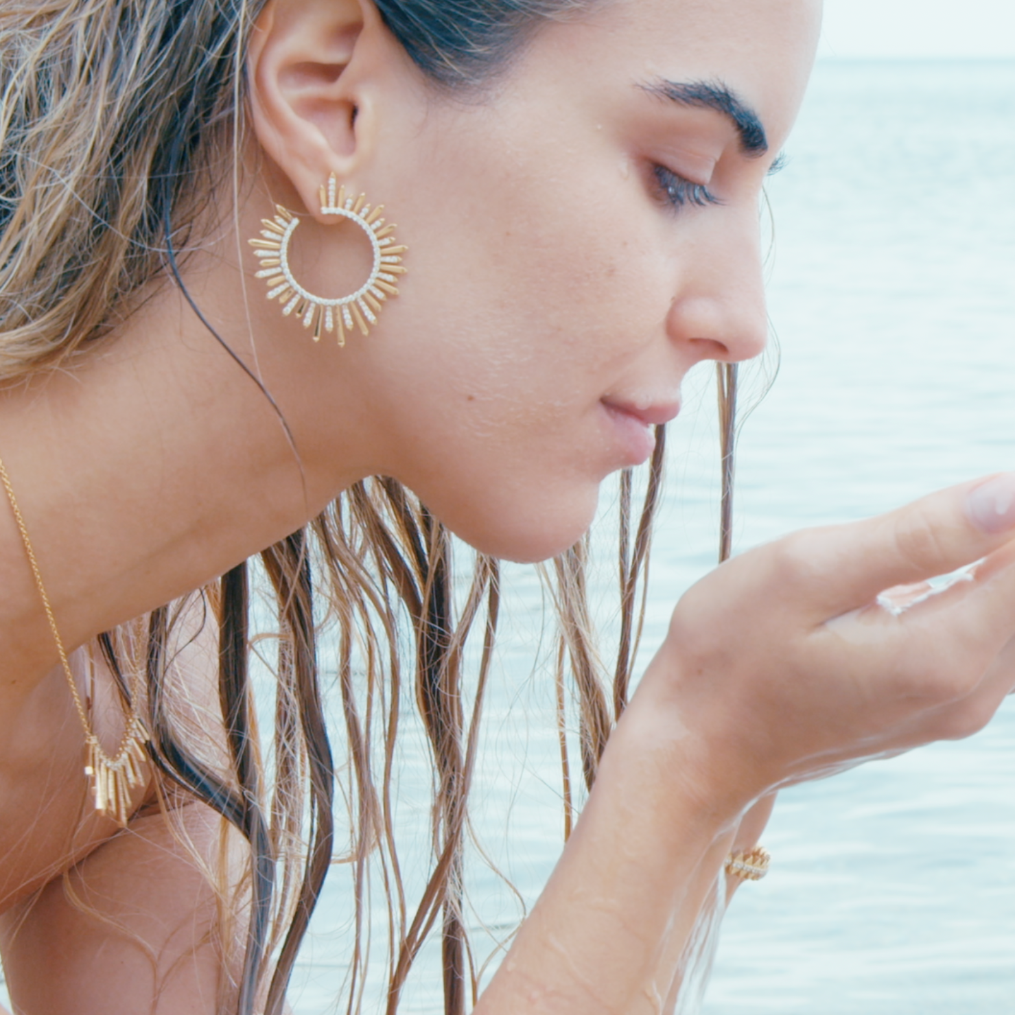 polaris earrings and pendant displayed on model