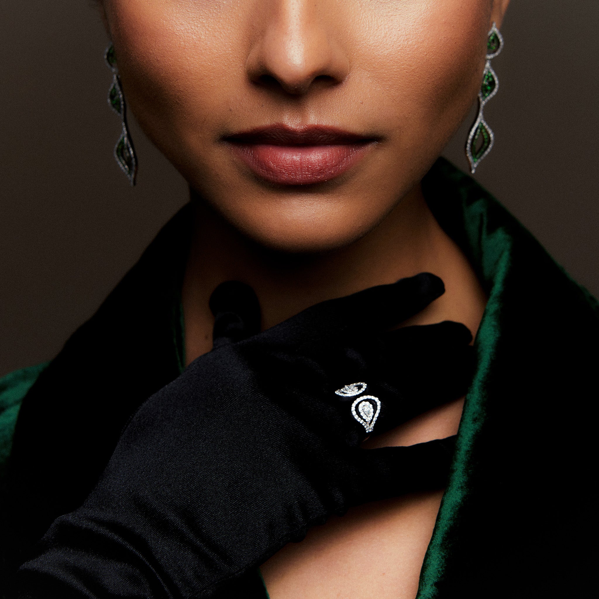 Double Venus Ring: Crafted in white gold with dazzling diamonds, presented on model.