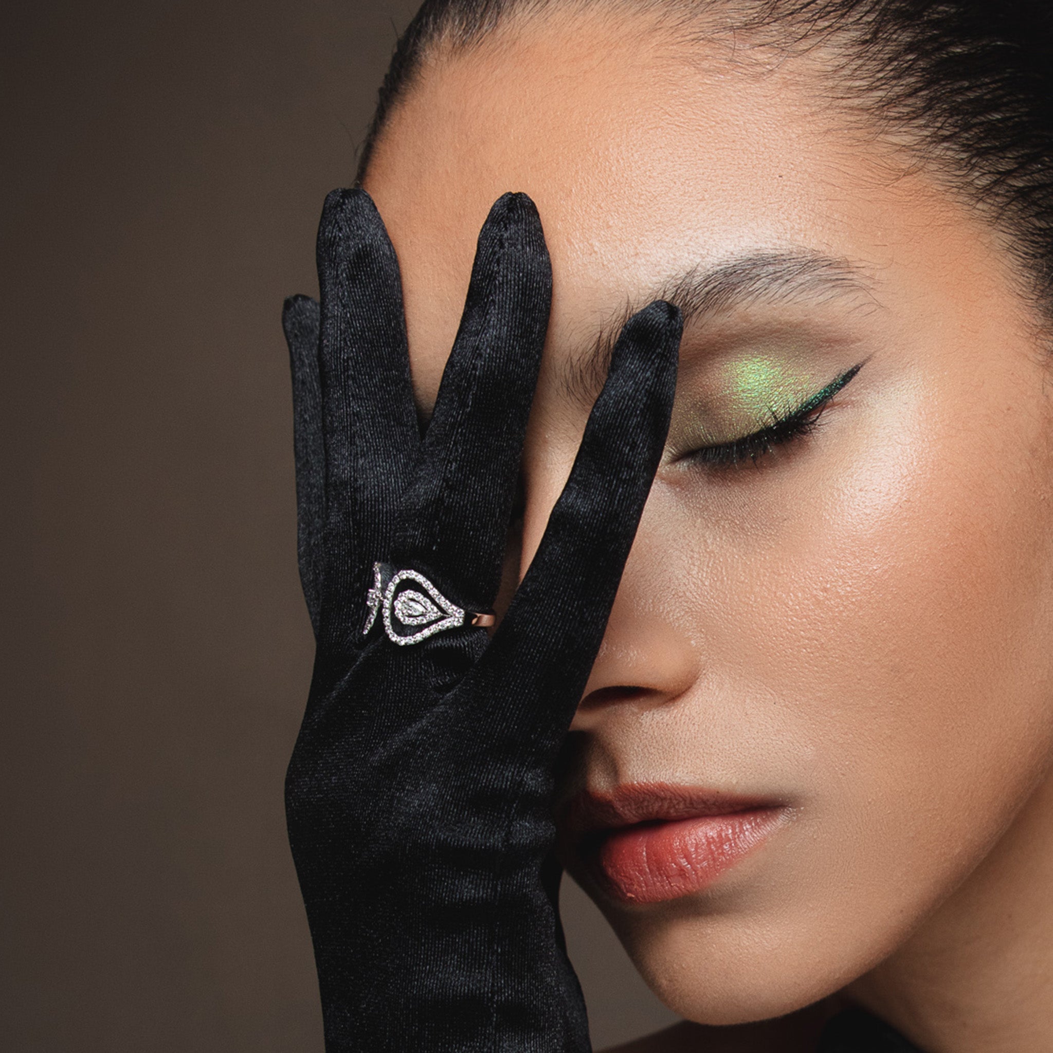 Double Venus Ring: Crafted in white gold with dazzling diamonds, presented on model.