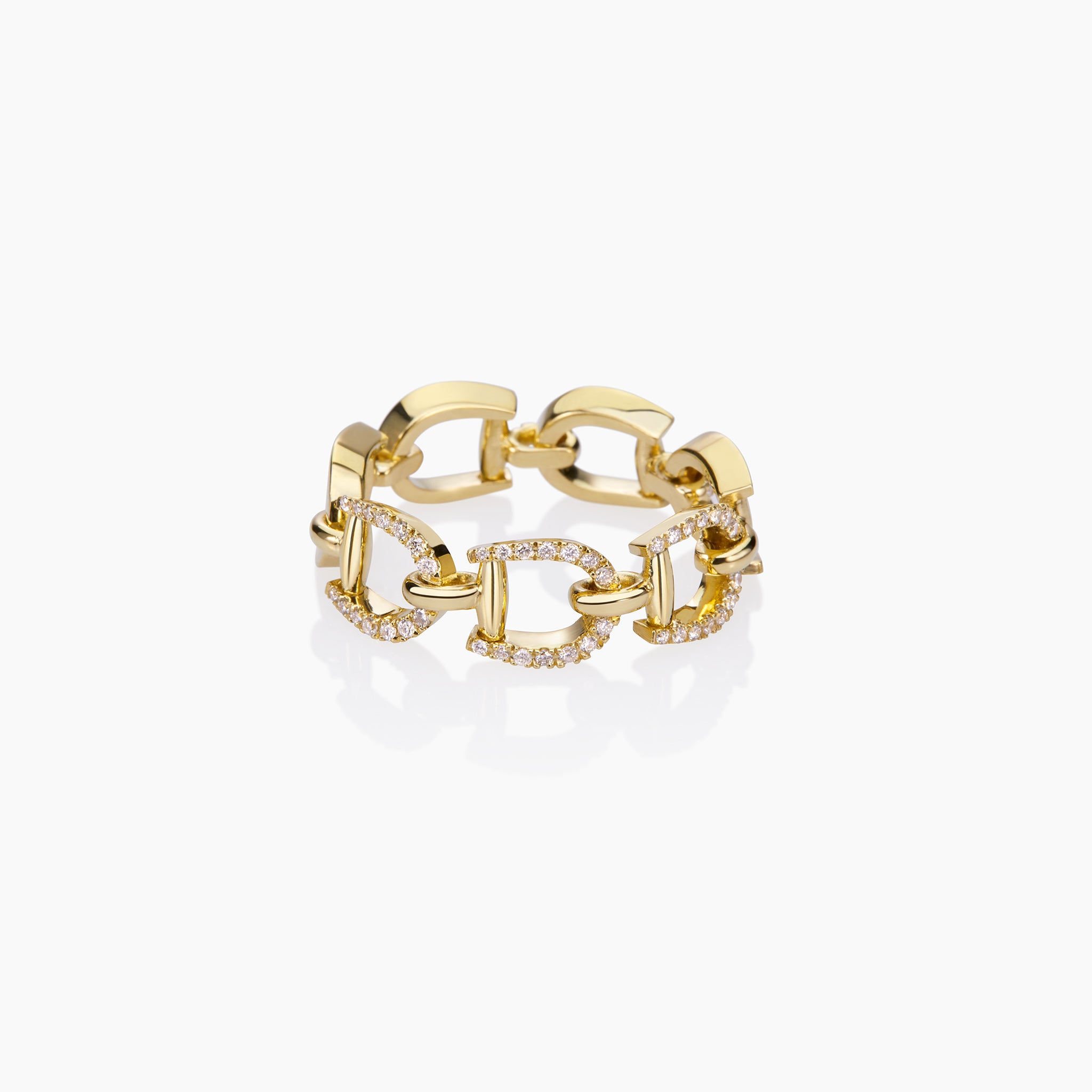 Versatile Fulanda Horsebit Chain Ring in yellow gold displayed on an off white background.