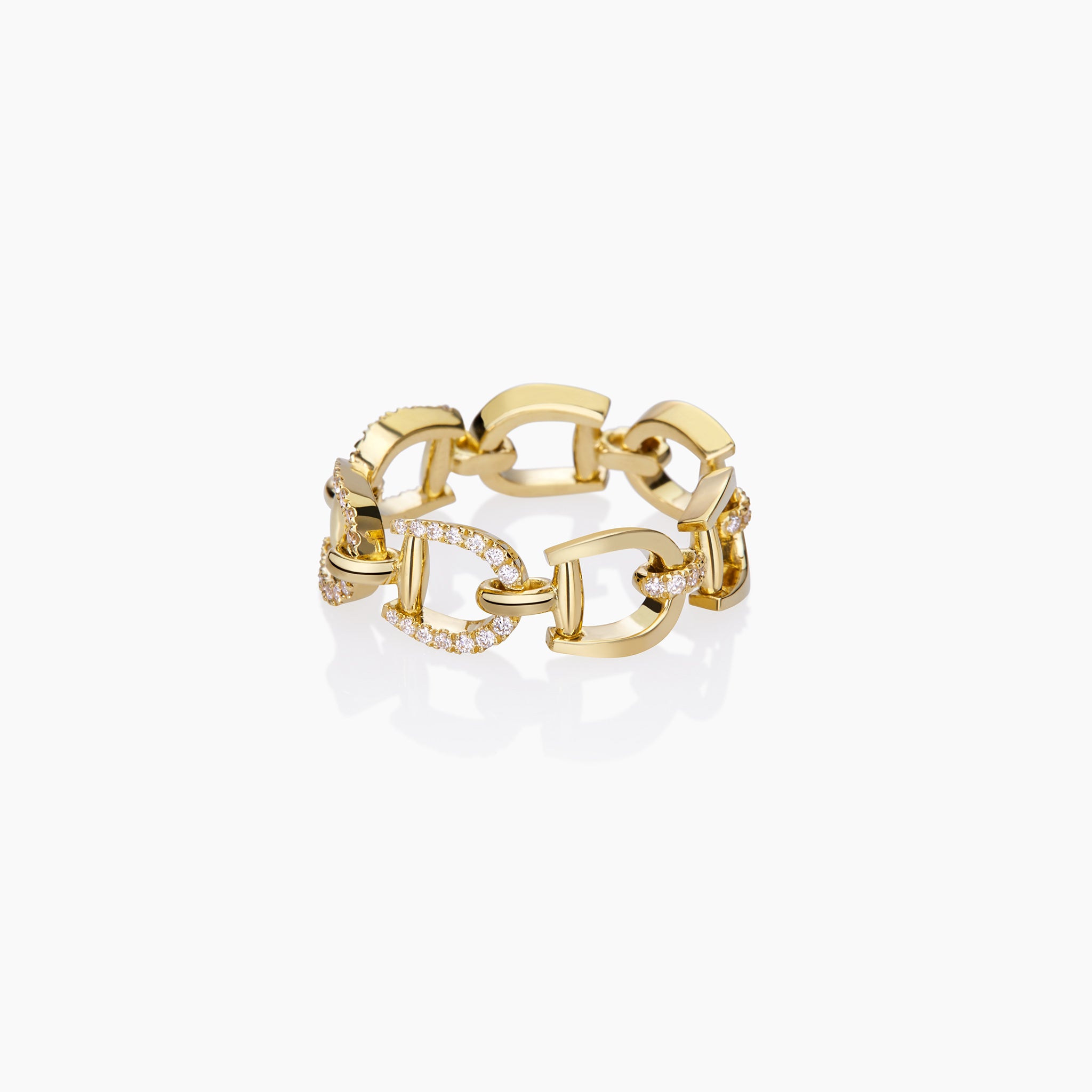 Versatile Fulanda Horsebit Chain Ring in yellow gold displayed on an off white background.