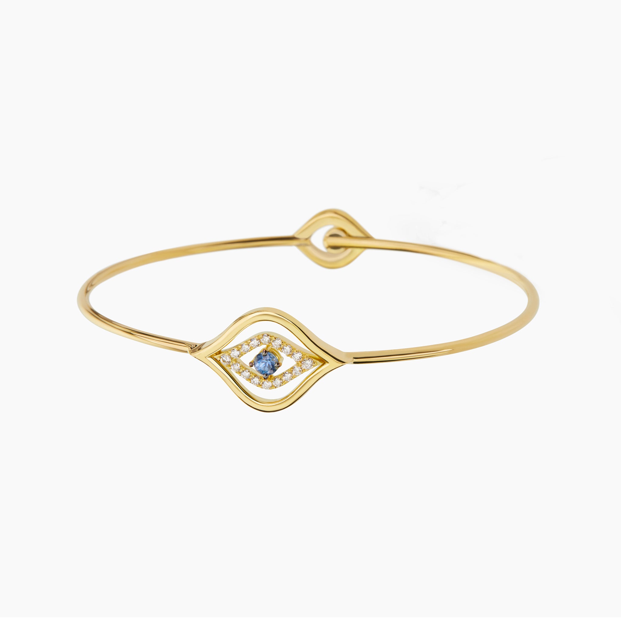 Evil Eye Bangle displayed on an off white background.