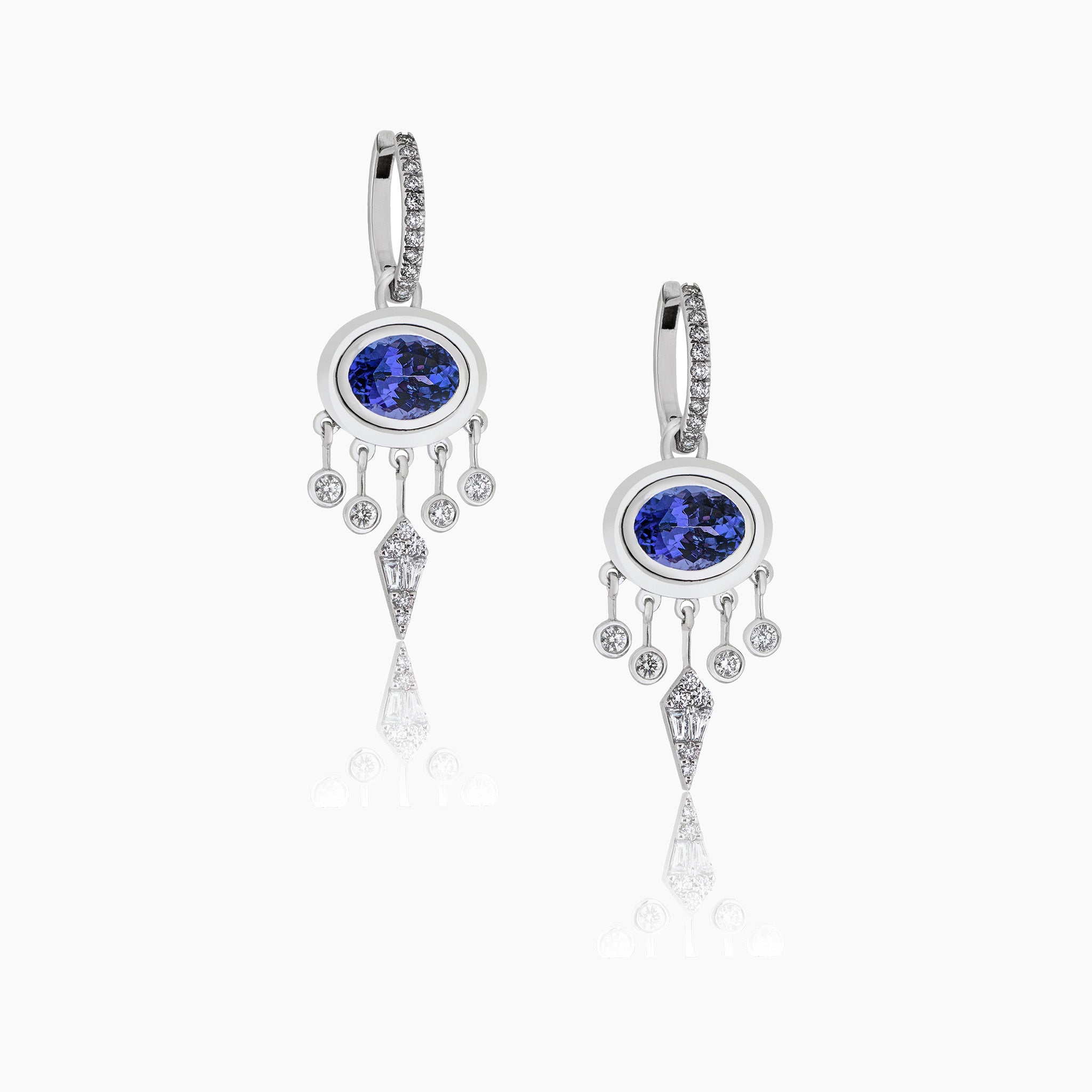 Gypset Earrings: Diamond and Tanzanite Jewellery Set on an Off-White Background