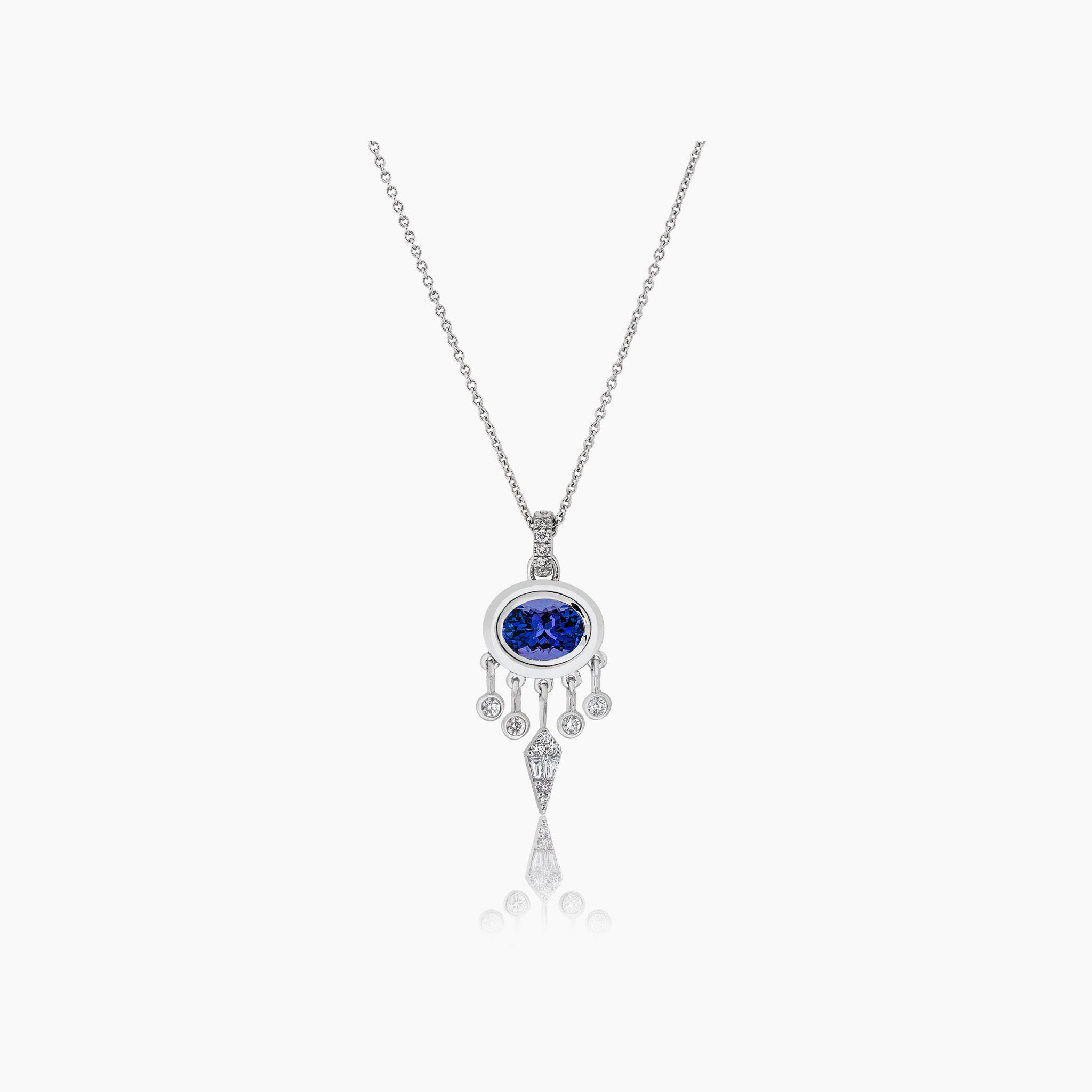 A captivating pendant featuring glistening diamonds and a mesmerizing tanzanite gemstone, showcased against an off-white background.