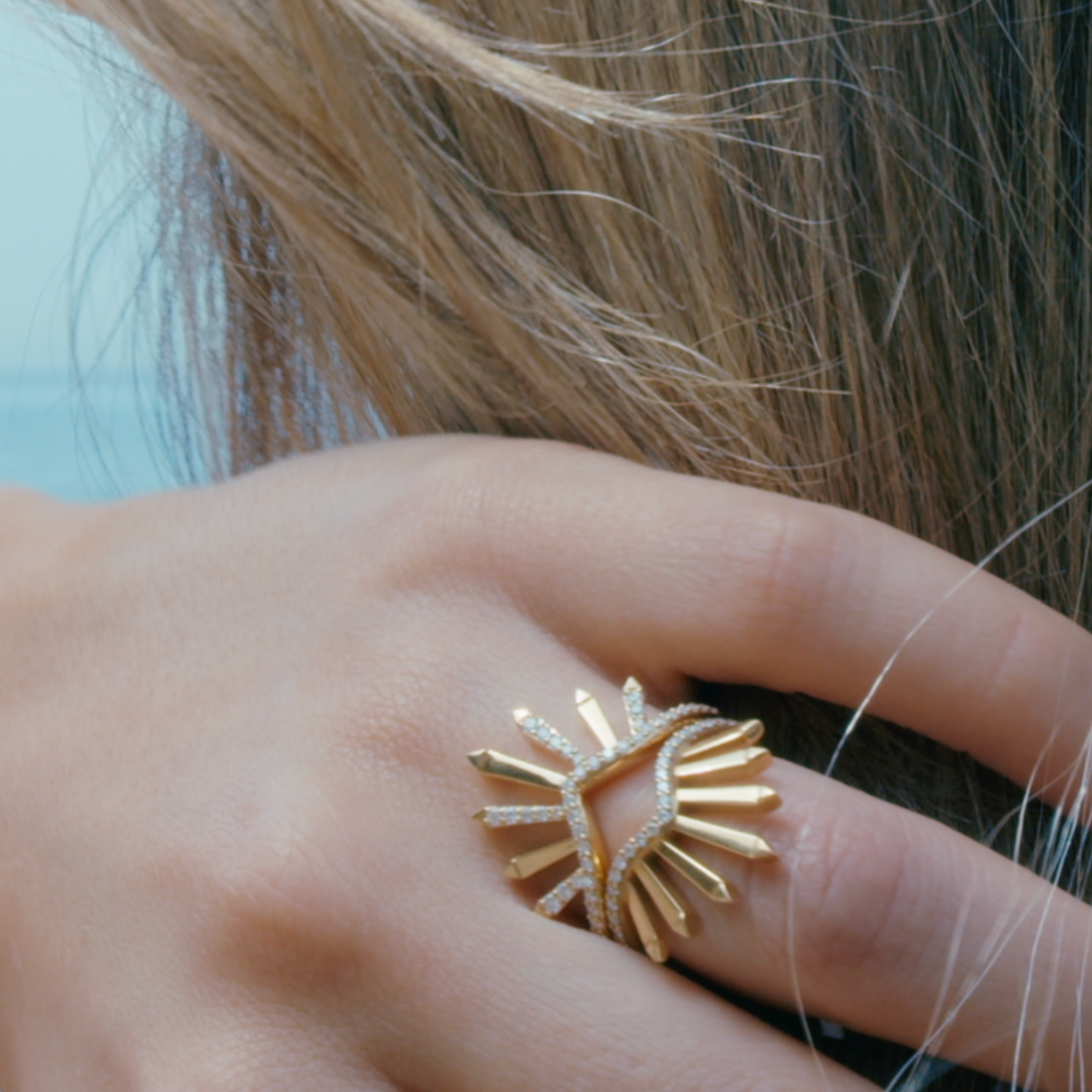 dragon rings displayed together on hand model