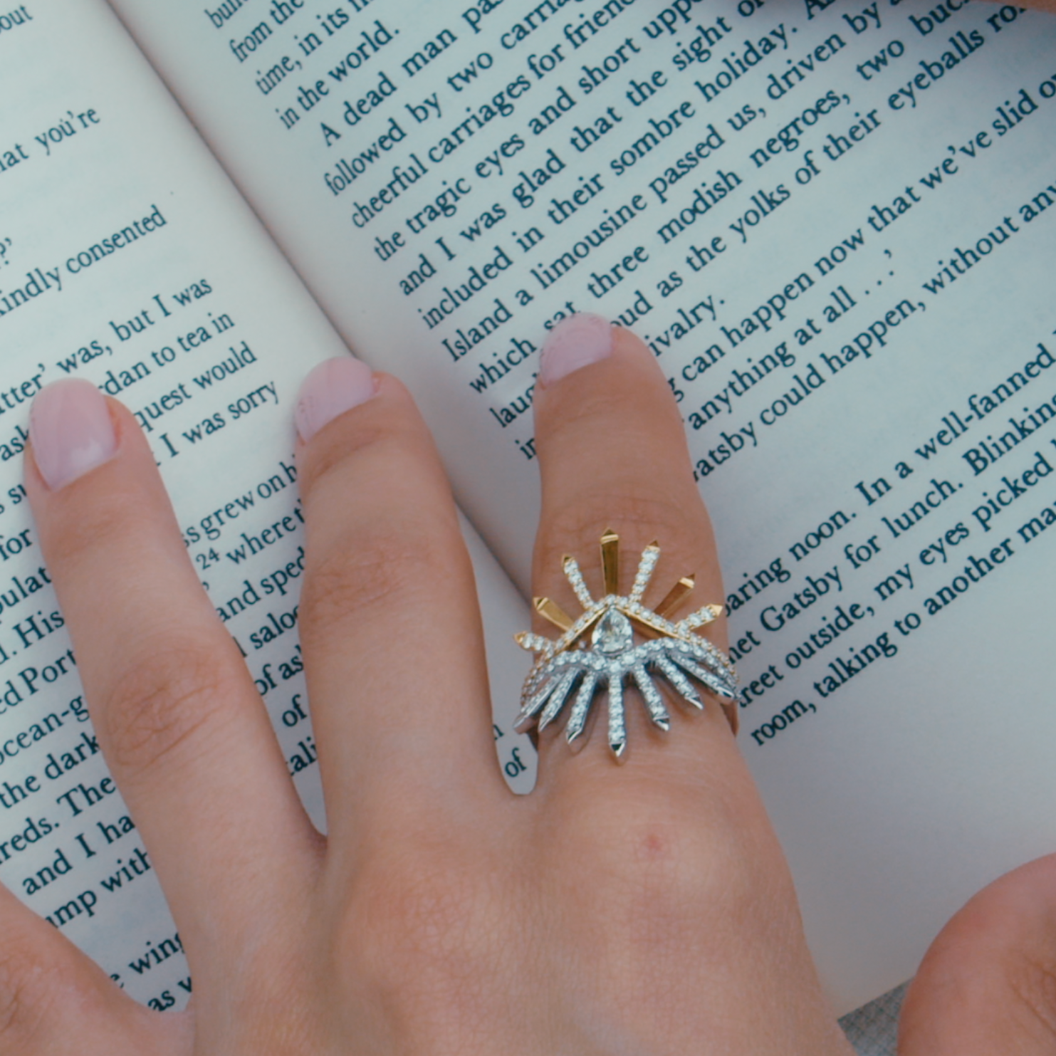 two dragon rings displayed together on hand model