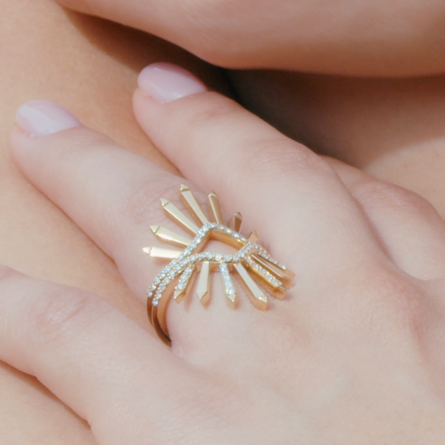 dragon rings displayed on hand model 