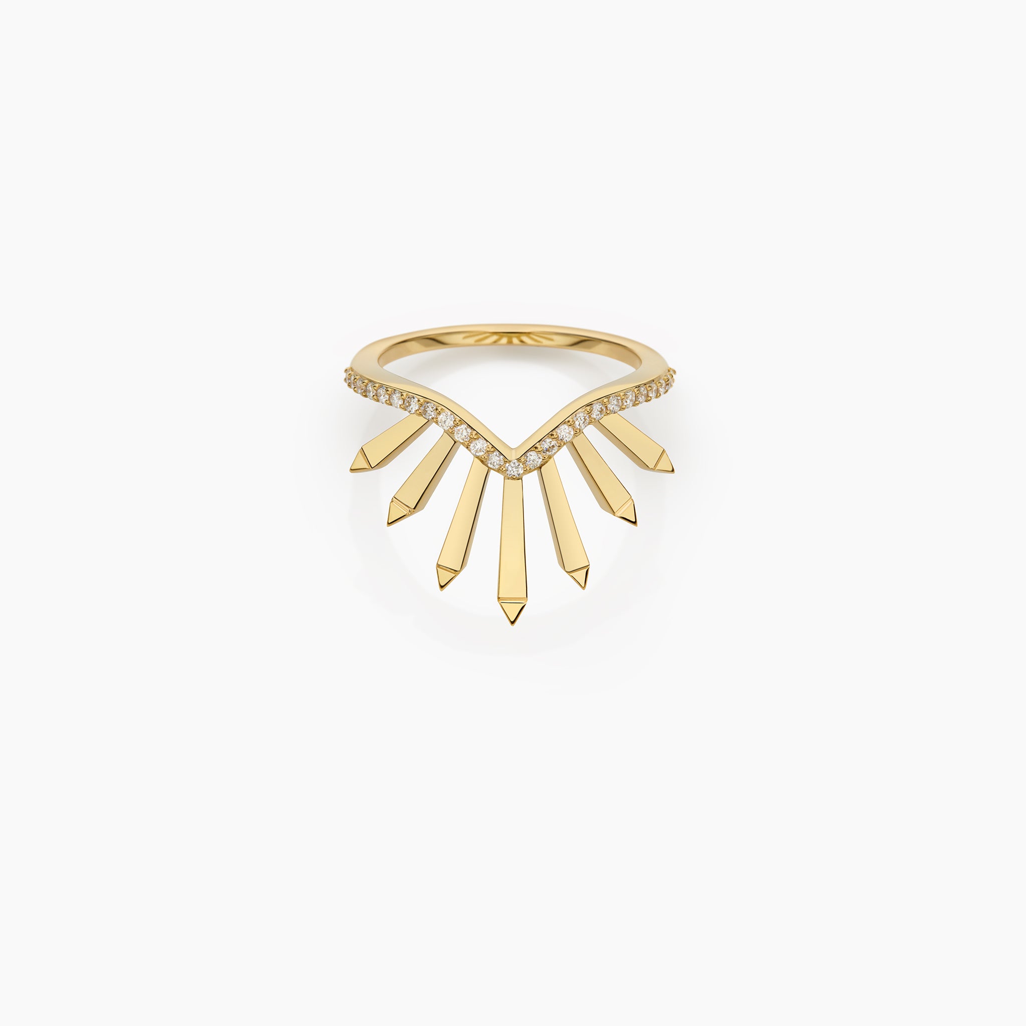 Yellow Gold Ring: Featuring radiant sunburst motifs adorned with diamonds, showcased against an off-white background.