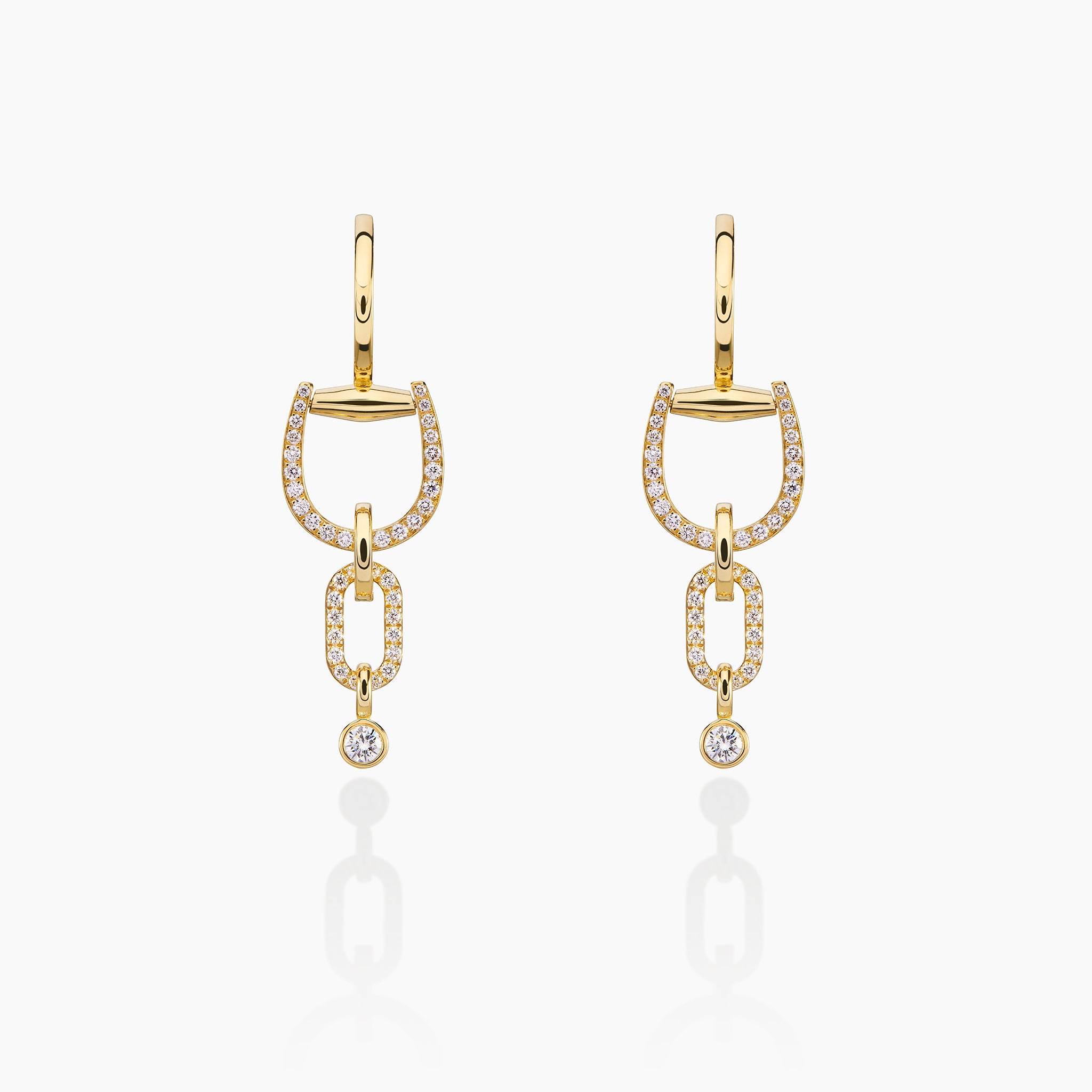 Convertible Horsebit Hoop Earrings displayed against off white background 