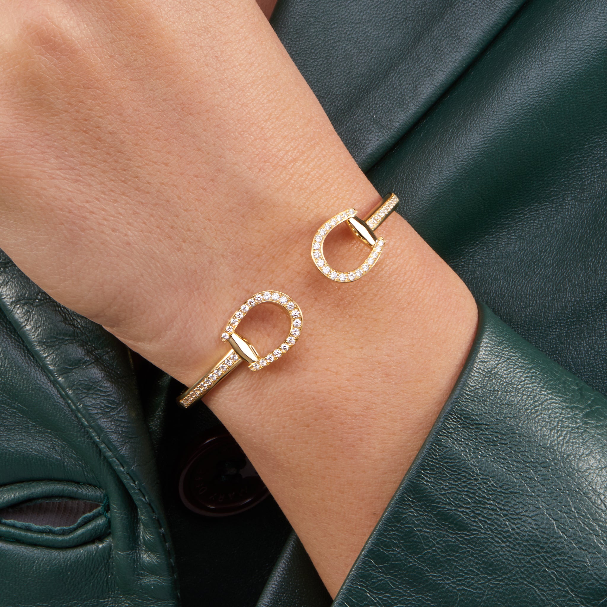 Horsebit Saddle Bracelet  displayed on a model 
