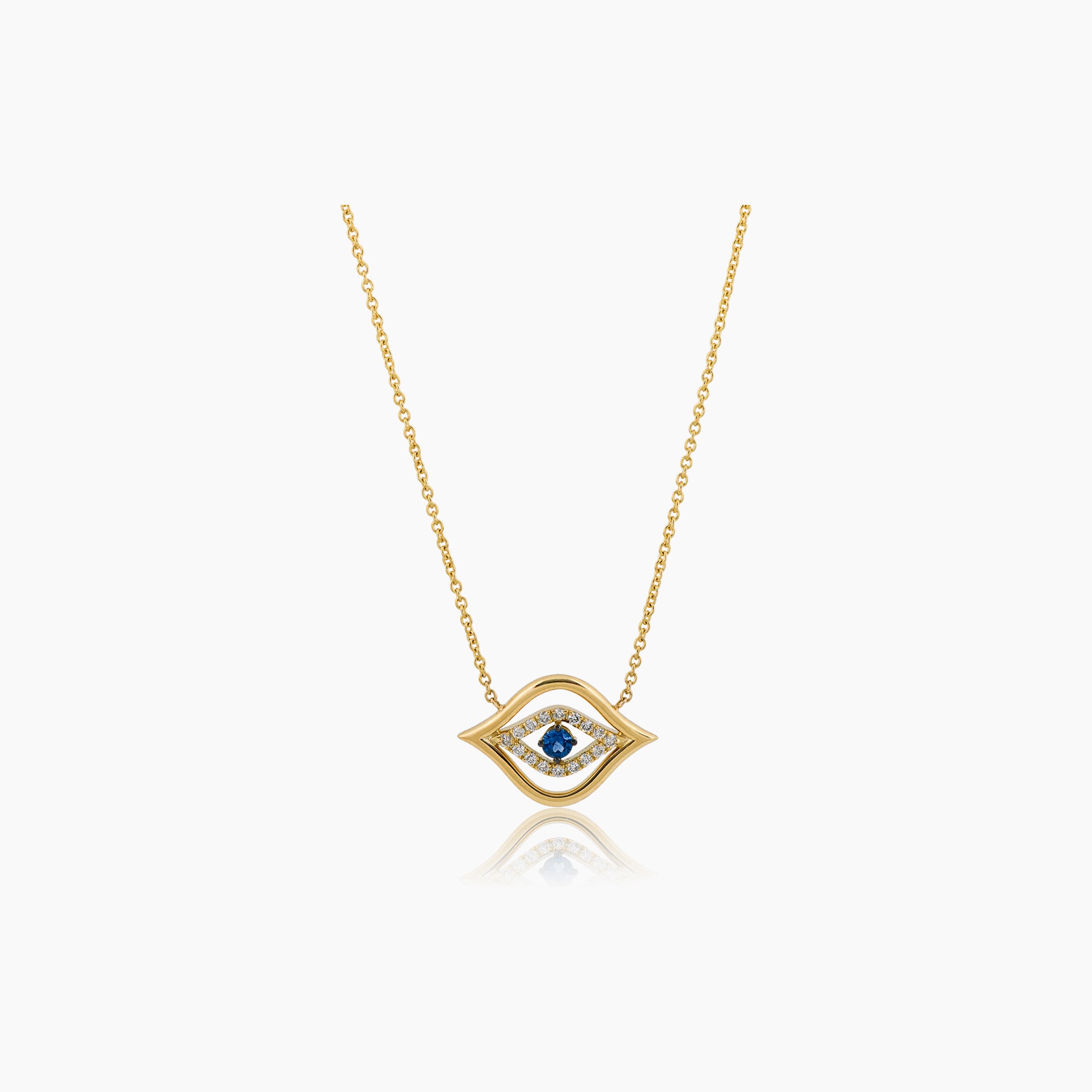  A captivating pendant featuring the protective Evil Eye design adorned with sparkling diamonds and a round brilliant sapphire, showcased against an off-white background.