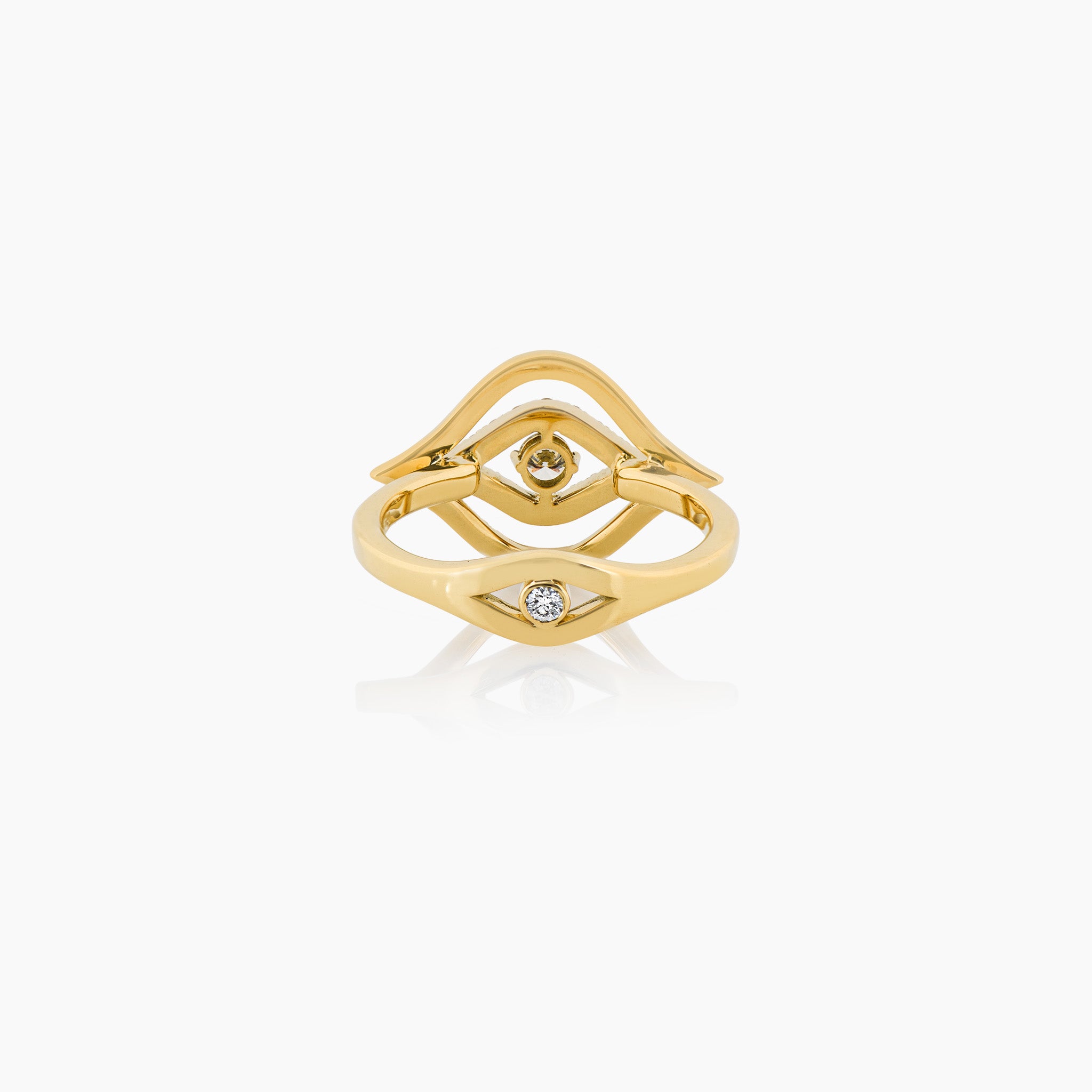 Evil Eye Diamond Ring: A captivating diamond-studded Evil Eye ring, displayed on an off-white background.
