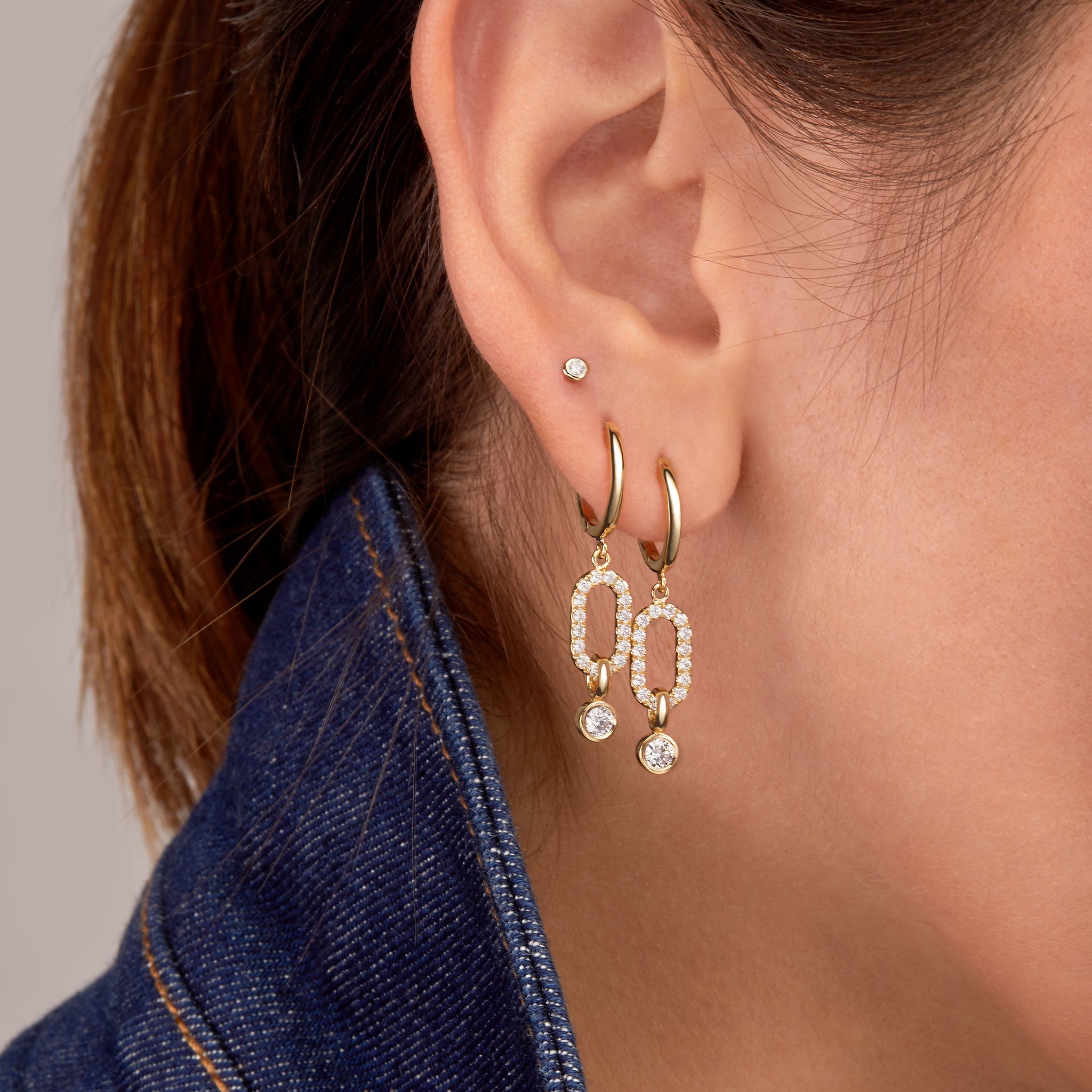 Fulanda Link Diamond Earrings stacked on one ear displayed on model 