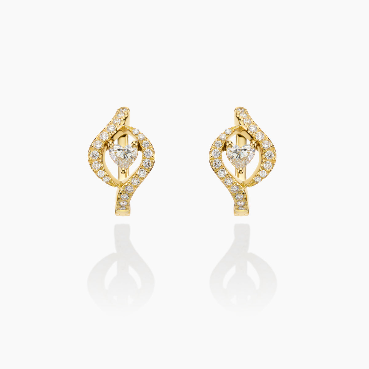 Gold  Heart earrings with diamond displayed on a white background