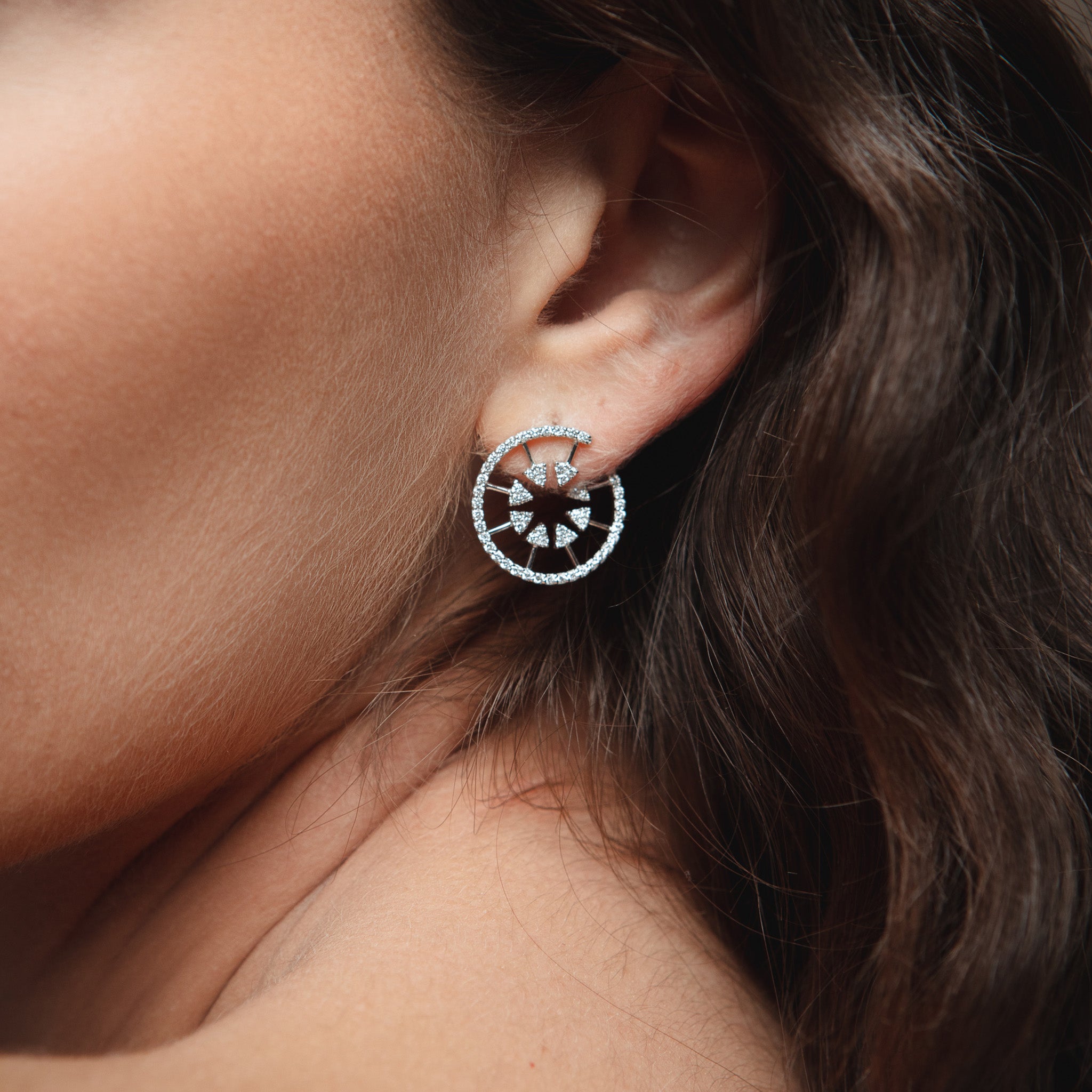 Hercules Earrings: Greek Mythology-Inspired Diamond Spiral Shield Design displayed on model.