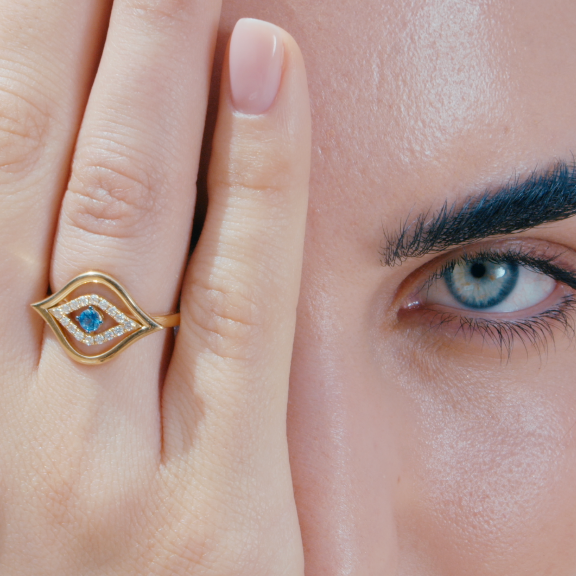 evil eye ring on model 