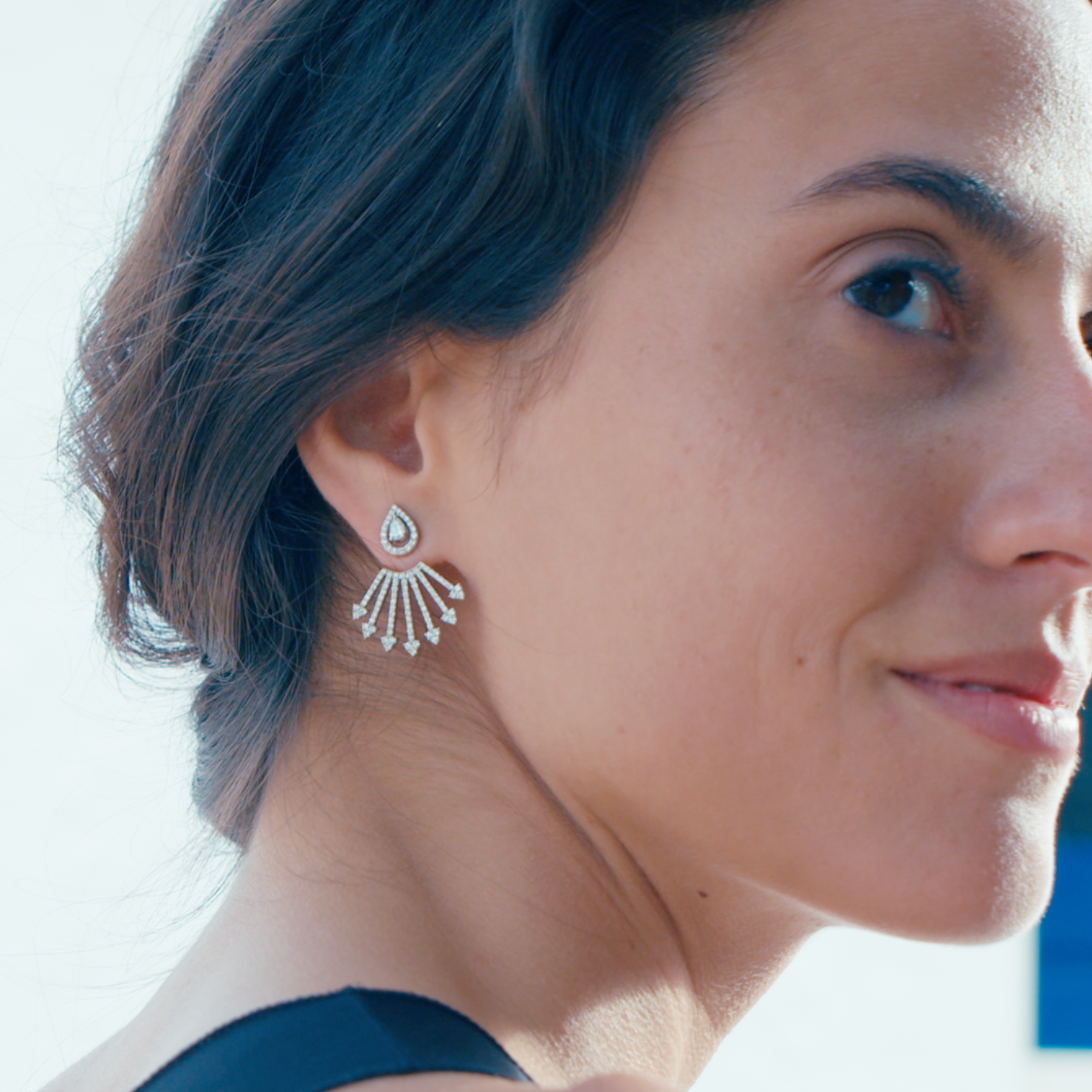 Diamond stud earrings with optional extensions, fine jewellery showcased on a model.